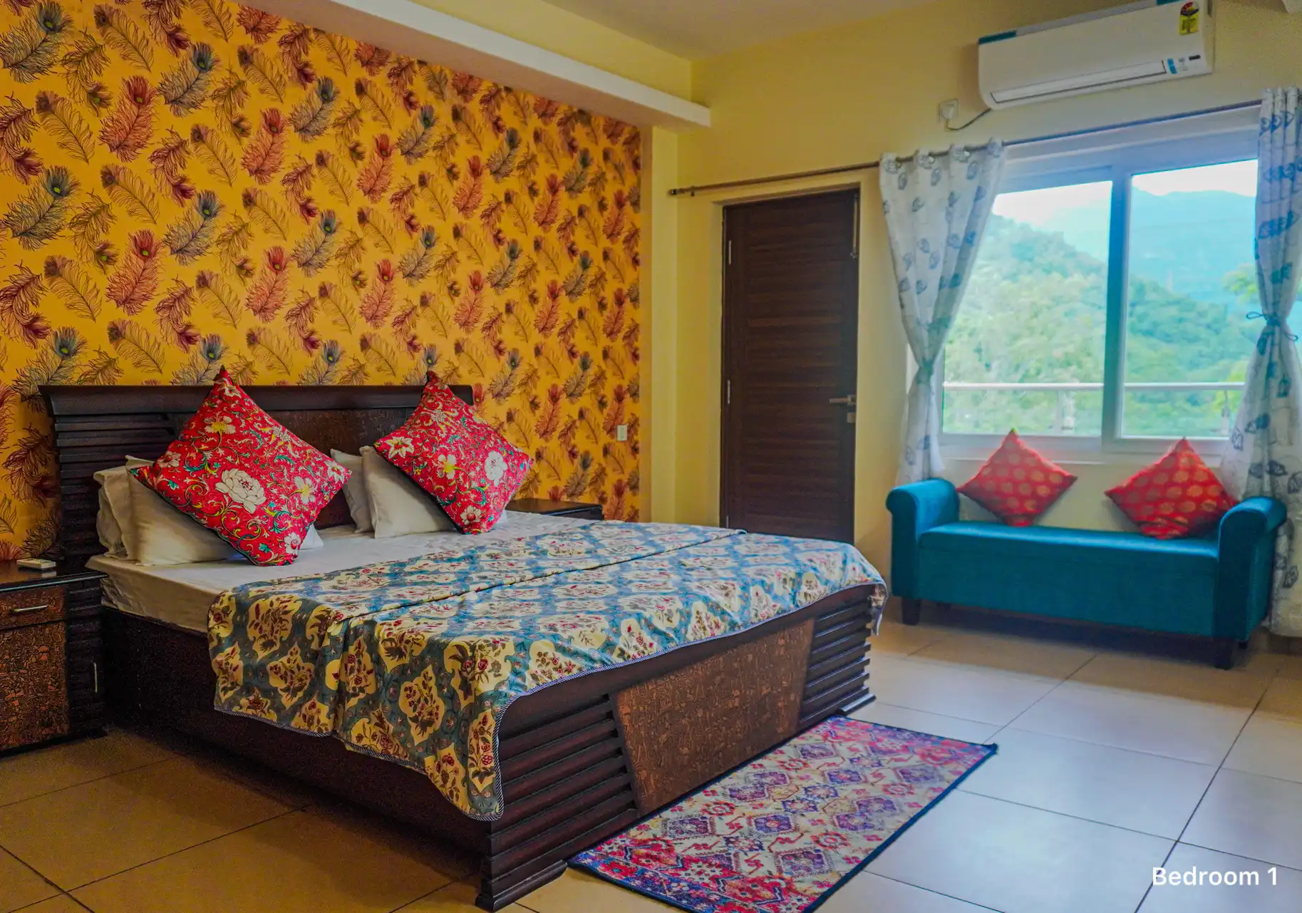 Bedroom 1 with mountain views at Ganges Heaven